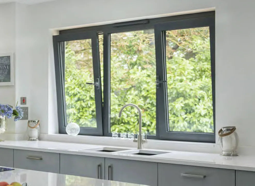 Casement windows installed above a residential kitchen counter